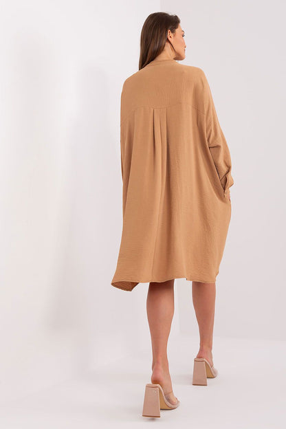 Sophisticated Italy Moda buttoned shirt dress, designed with long sleeves and functional side pockets for a refined look.