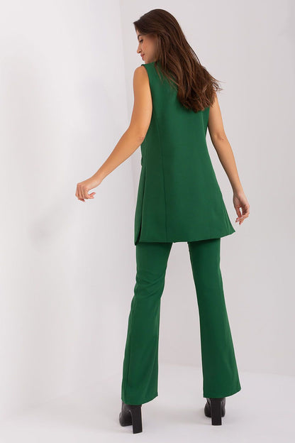 Chic and sophisticated women’s attire by Italy Moda, featuring stylish wide-leg trousers and a sleek vest.