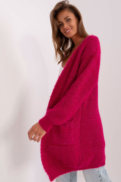 Luxurious knee-length cardigan by Italy Moda, designed with practical slip pockets and a loose, comfortable fit.