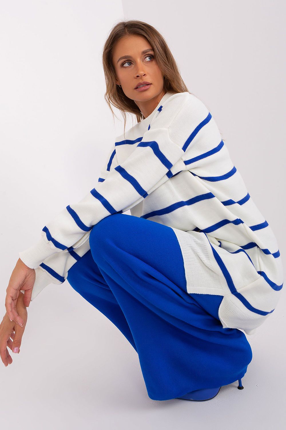 Stylish long sleeve striped sweater from Factory Price, made of luxurious 100% acrylic for effortless chic and comfort.