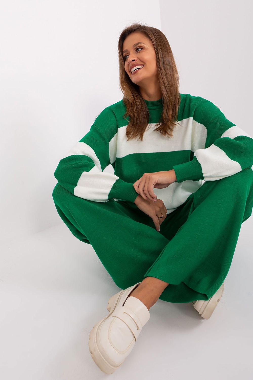 Elegant wide striped acrylic sweater from Factory Price, ideal for stylish layering in colder weather.