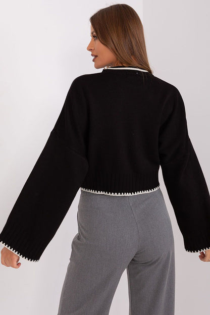 Luxurious 100% acrylic short sweater with fashionable wide sleeves by Factory Price, designed for everyday elegance and comfort.