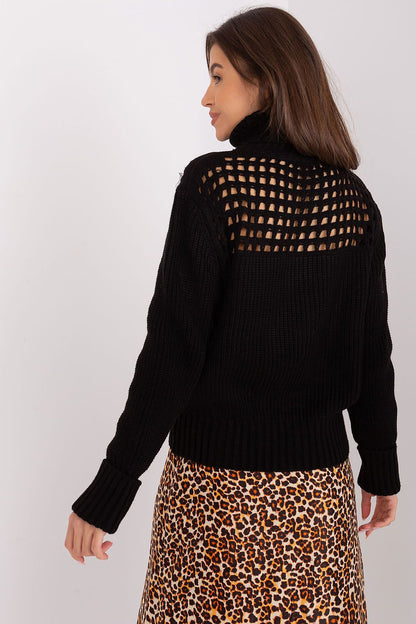 Woman wearing the Luxury 100% Acrylic Turtleneck Sweater by Factory Price, exuding sophistication and warmth in a winter setting.