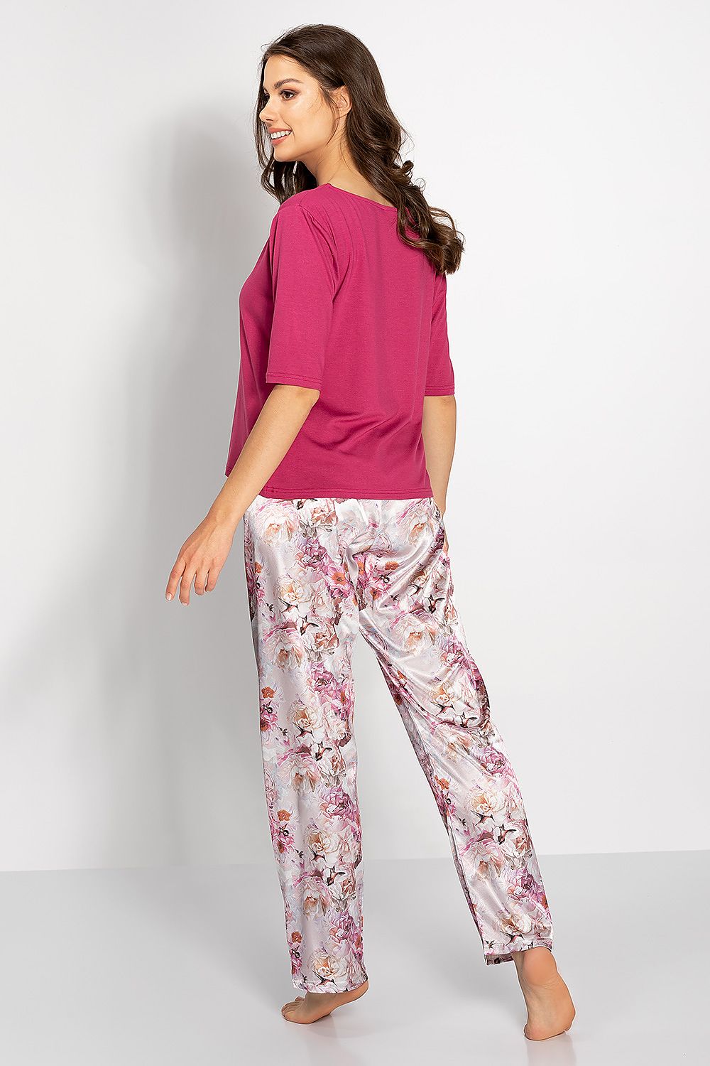 Luxury Women's Pyjamas Set by Momenti Per Me, showcasing a chic design with a half-round neckline and elegant long pants for ultimate comfort.