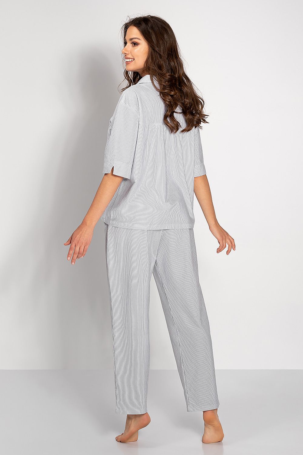 Luxurious Women's Cotton Pajamas Set from Momenti Per Me, designed with an oversized fit, elegant muted colours, and practical pockets, crafted for ultimate comfort.