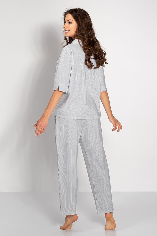 Luxurious Women's Cotton Pajamas Set from Momenti Per Me, designed with an oversized fit, elegant muted colours, and practical pockets, crafted for ultimate comfort.