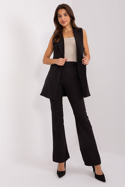 Model showcasing the high-waisted, elegant trousers and lined vest set by Italy Moda, perfect for sophisticated women's attire.