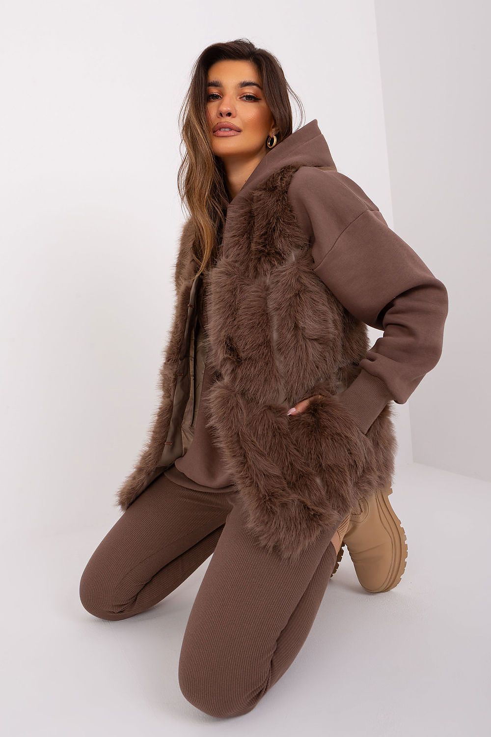 Fashionable and refined Polyester Fur Vest by AT, featuring a minimalist design with a hook-and-loop closure, ideal for contemporary outfits.
