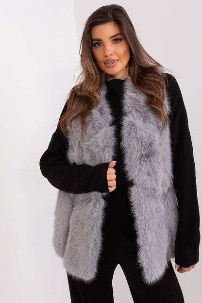 Luxurious polyester fur vest by AT featuring elegant slip pockets and a refined hook-and-loop closure, perfect for versatile styling in any season.