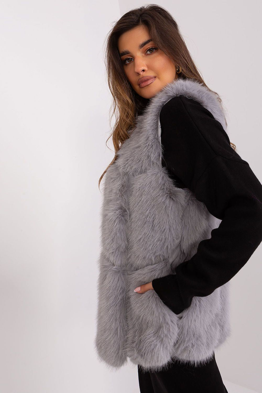 Classic polyester fur vest by AT with a sophisticated aesthetic, designed for versatile wear and includes a stylish hook-and-loop closure.