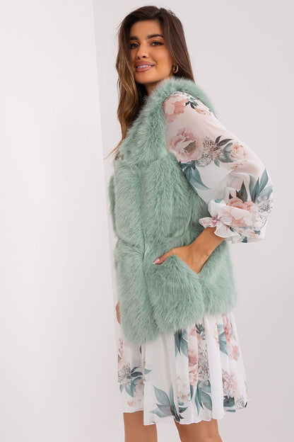 Stylish and elegant polyester fur vest by AT designed for various occasions, showcasing a lightweight design without a hood for added versatility.