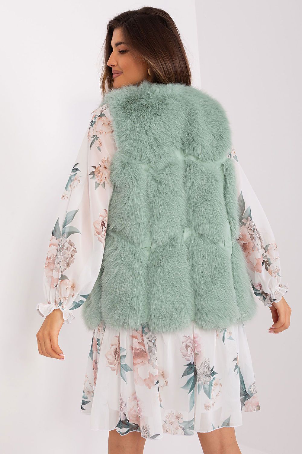 Elegant polyester fur vest by AT featuring slip pockets and hook-and-loop closure, ideal for stylish layering in autumn and winter.