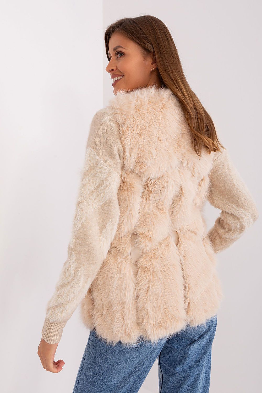 Luxurious polyester fur vest from AT, showcasing a classic design with versatile colour options, ideal for both casual and formal wear.