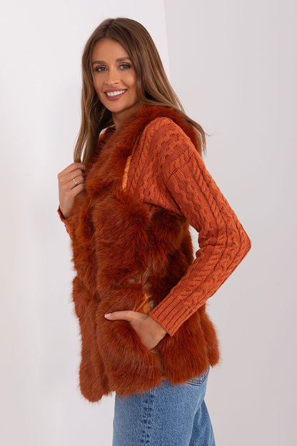 Stylish polyester fur vest designed by AT, highlighting an elegant hook-and-loop closure, perfect for adding a touch of sophistication to any outfit.