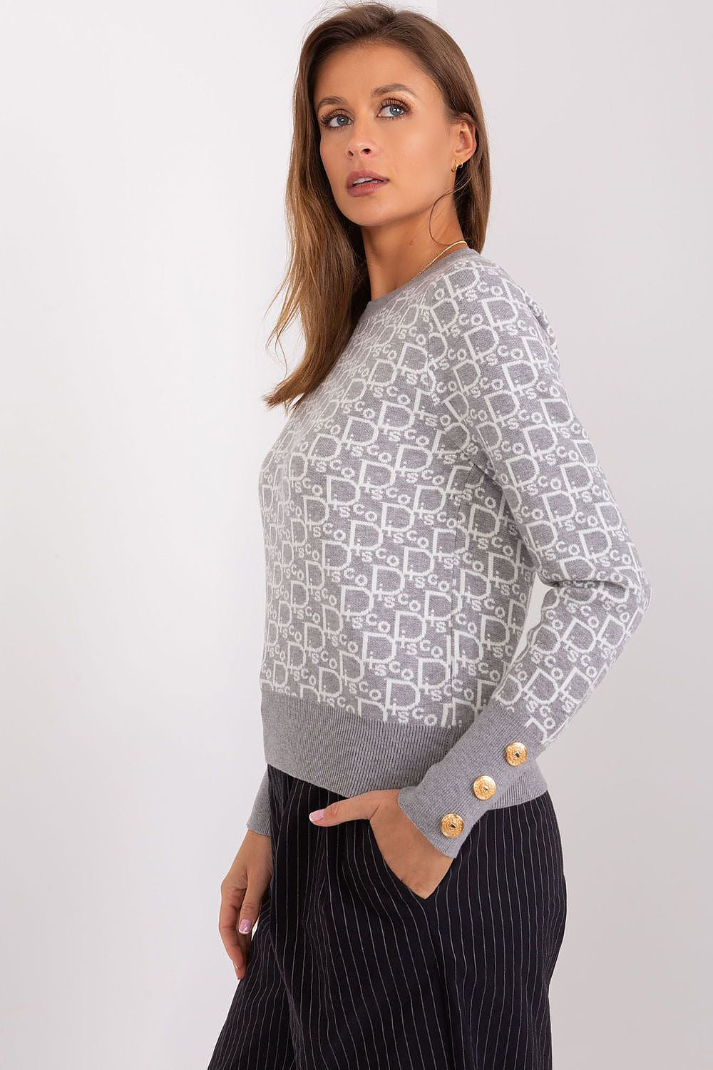 Stylish long sleeve jumper with a decorative cuff design and distinctive print by AT, ideal for a chic casual outfit.