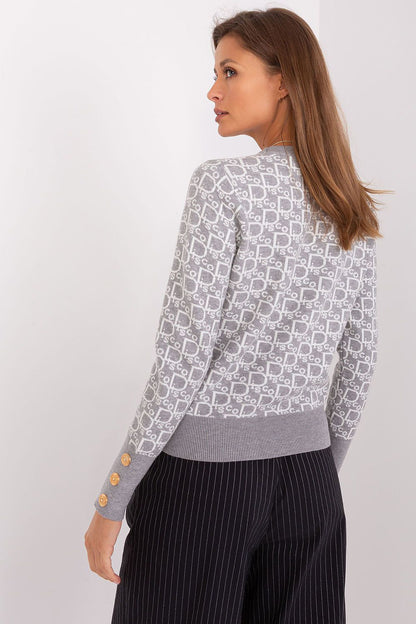 Elegant long sleeve jumper by AT featuring decorative cuffs and a distinctive print, perfect for stylish autumn outings.