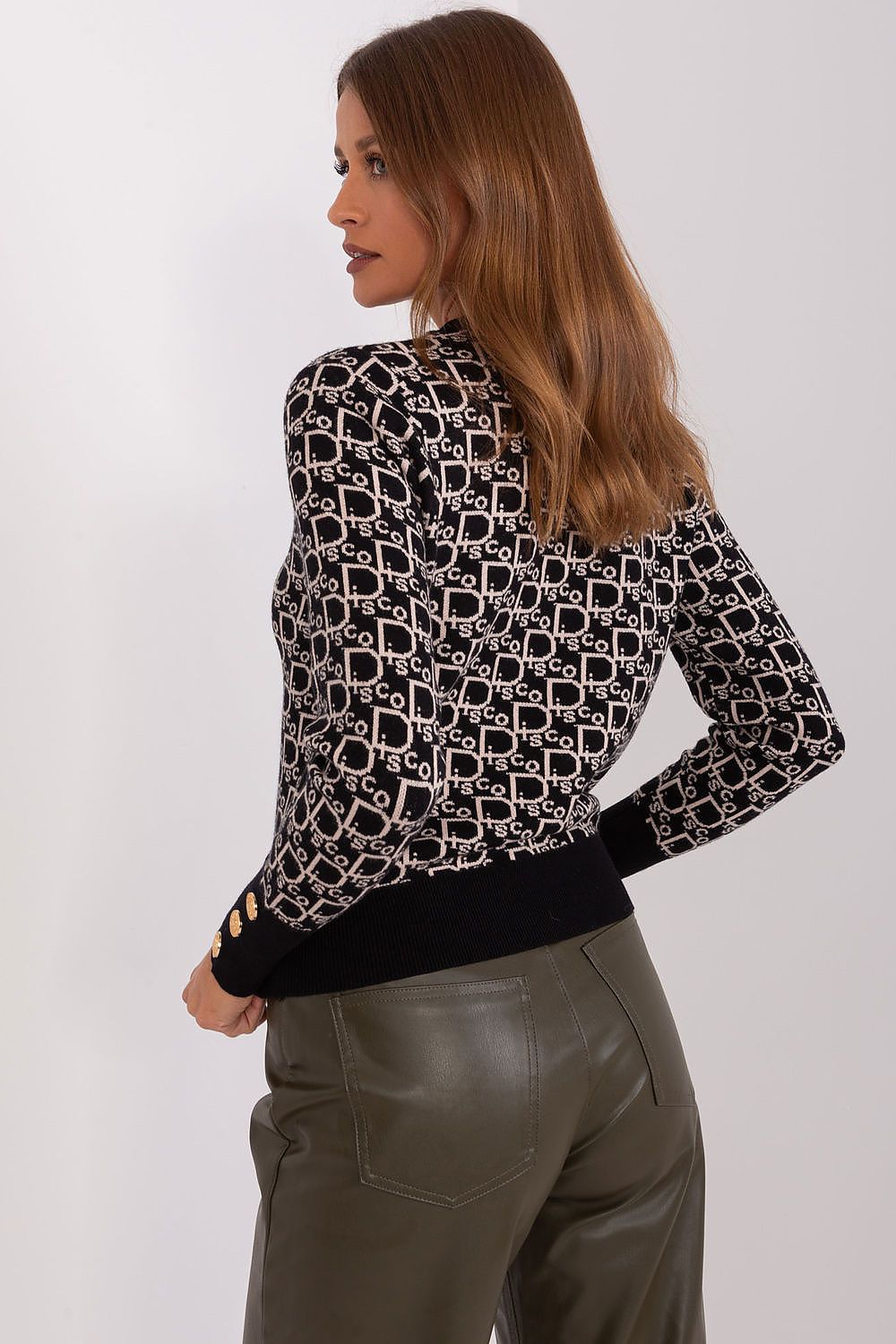AT's sophisticated long sleeve sweater with fashionable cuffs and a distinctive print, embodying comfort and style for the discerning wardrobe.