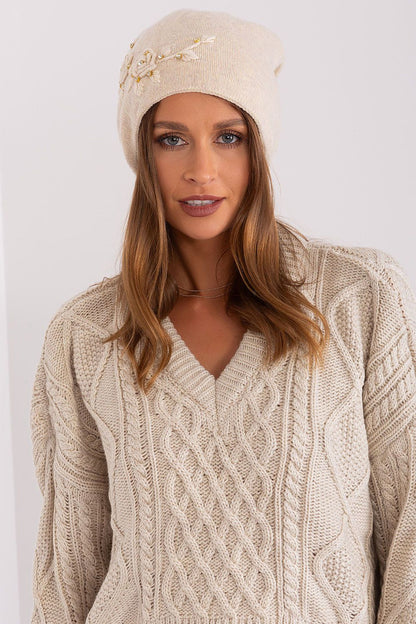 Elegant luxury women's winter hat by AT, made from a blend of acrylic, cotton, and cashmere for supreme comfort.