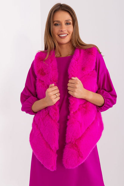 Stylish polyester fur gilet by AT, showcasing practical pockets and inner lining for warmth and comfort in a sophisticated look.