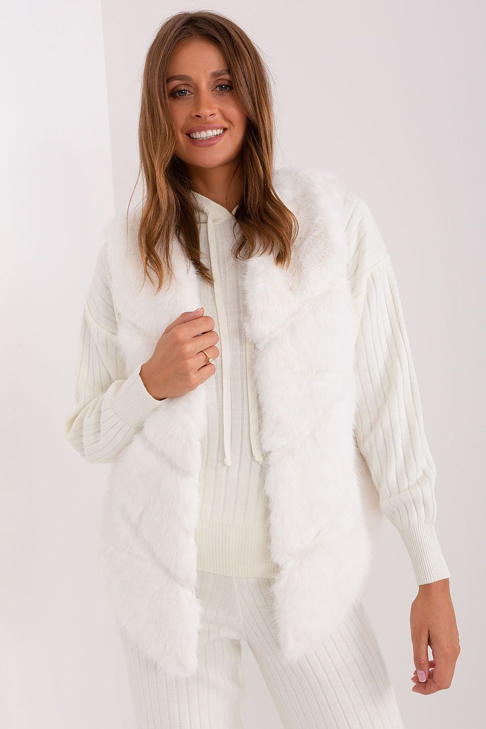 Luxury Women's Fur Vest by AT in soft polyester, featuring elegant pockets for warmth and casual style.