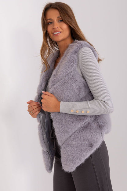 Sophisticated women's fur vest by AT, demonstrating comfort and style, ideal for layering in cold weather.
