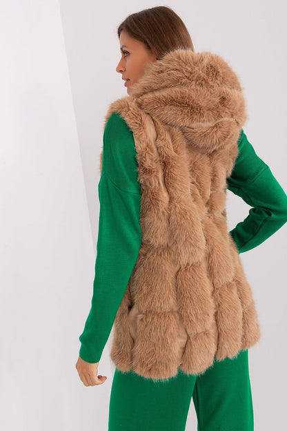 Sophisticated women's fur vest by AT, highlighting the practical zipper closure and functional pockets for daily wear.