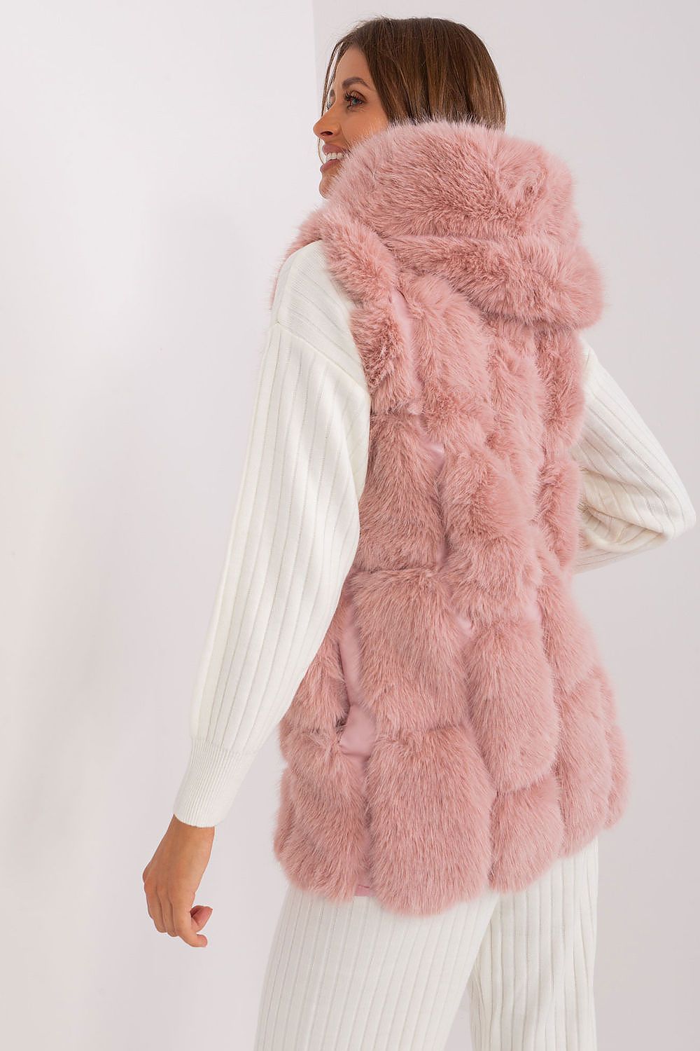Sophisticated women's polyester gilet by AT, showcasing a plush fur vest with a comfortable hood, ideal for adding elegance to any outfit.