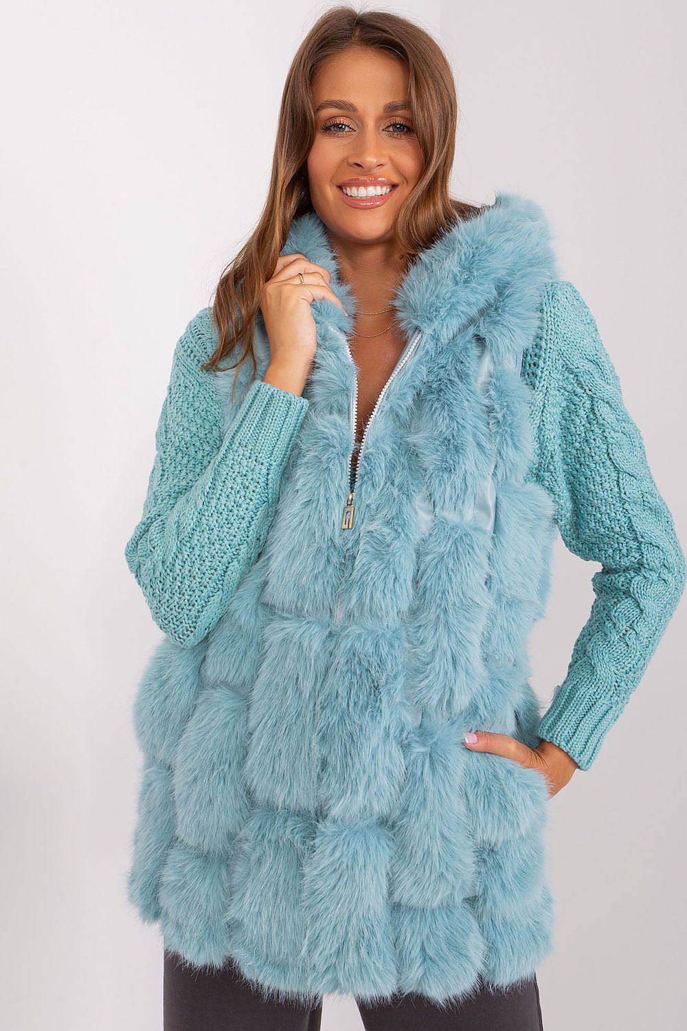 Stylish casual fur vest for women by AT, designed with a soft polyester finish and hood, perfect for colder days and fashionable outings.