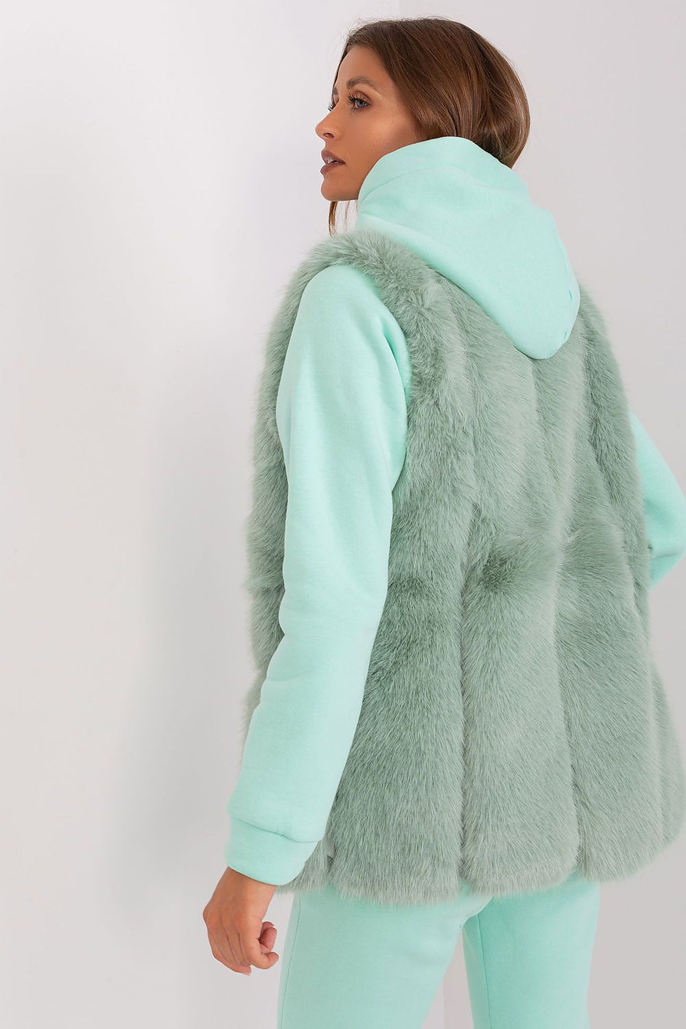 Cozy stylish gilet featuring soft fur texture from AT, ideal for layering this season.