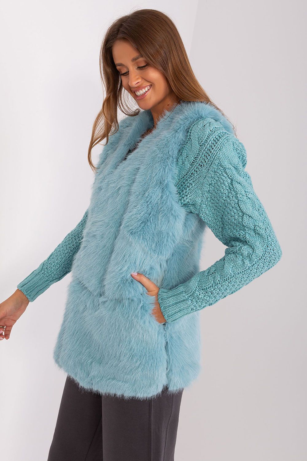 Versatile polyester fur gilet from AT, adding warmth and sophistication to any outfit.