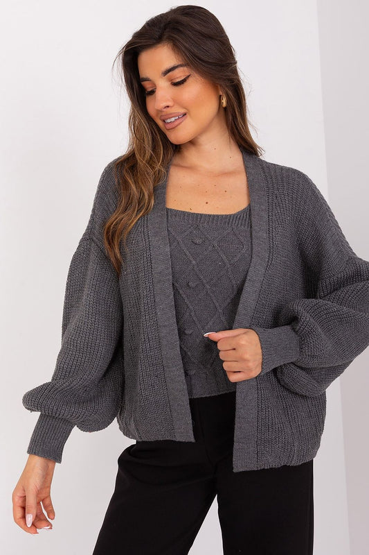 Elegant Badu cardigan set featuring a strapless top and long buff sleeves, perfect for stylish comfort on various occasions.