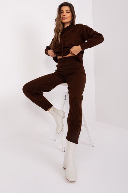 Luxurious Badu casual long sleeve hooded sweater paired with high-waisted pants, showcasing an elegant ribbed pattern for ultimate comfort and style.