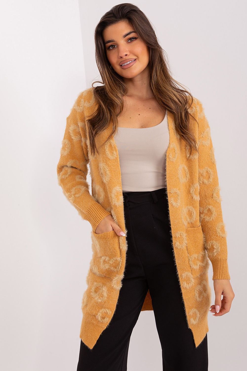 Luxury variegated knit cardigan with pockets by AT, showcasing its texture and design details, perfect for casual everyday wear.