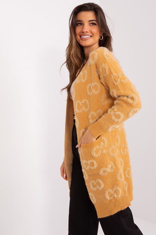 Close-up of the warm long sleeve luxury cardigan by AT, highlighting the fabric's variegation and stylish pockets.