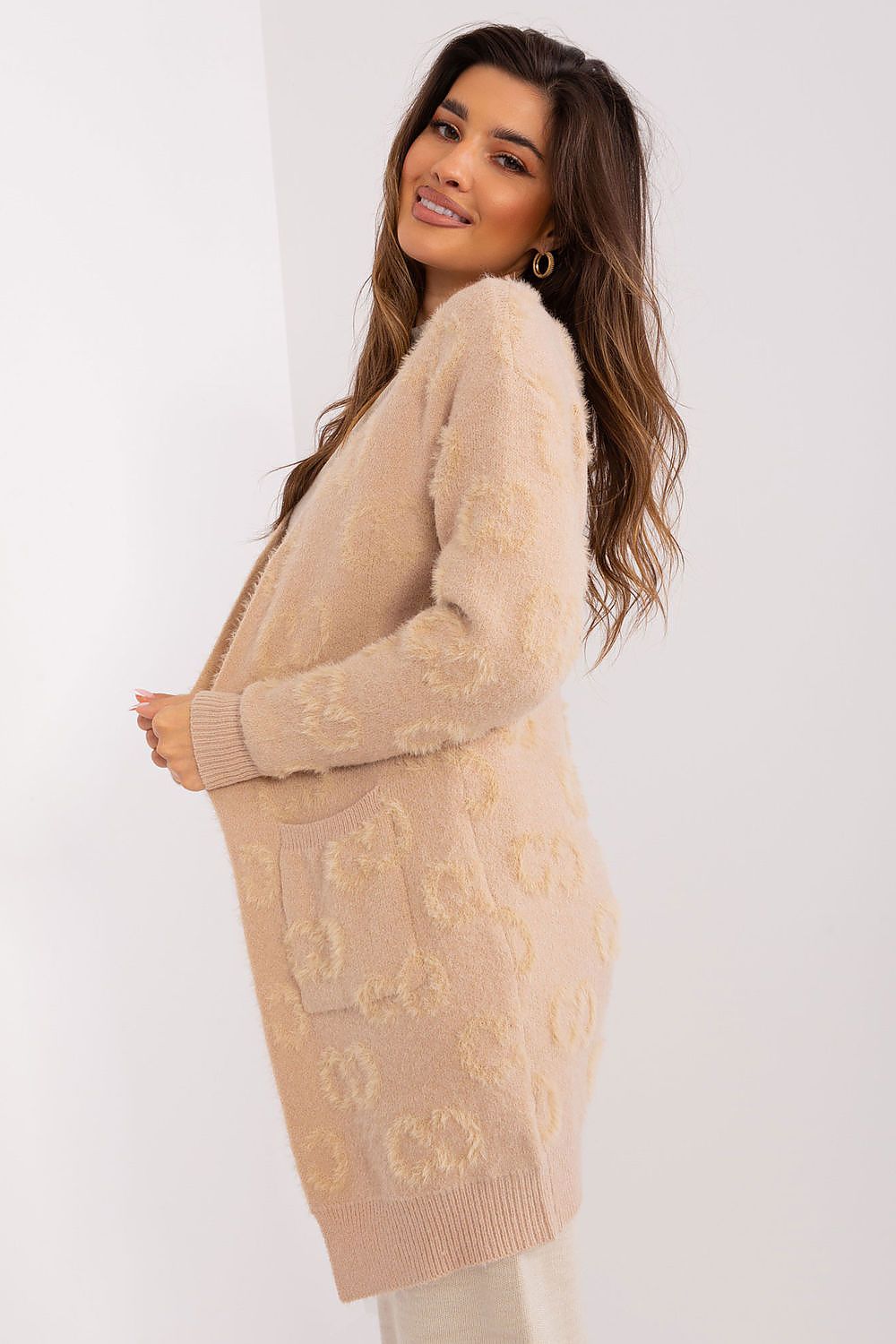 Casual yet fashionable long sleeve cardigan by AT, featuring a unique knit texture and pockets for convenience.