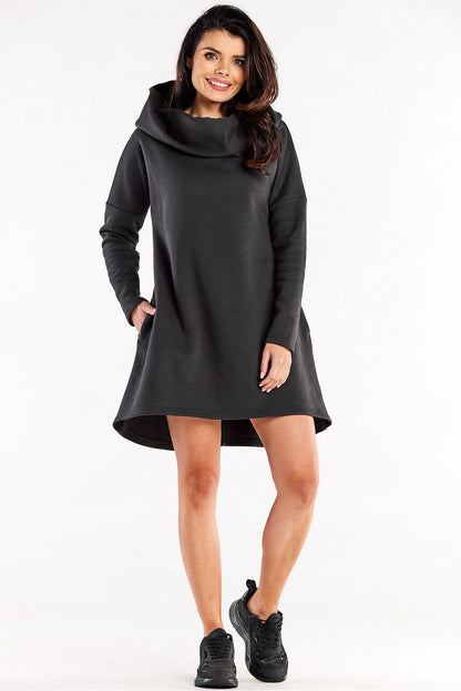 Model wearing the Elegant Loose Trapeze Dress with Long Sleeves and Hood by Infinite You, embodying stylish and relaxed luxury.