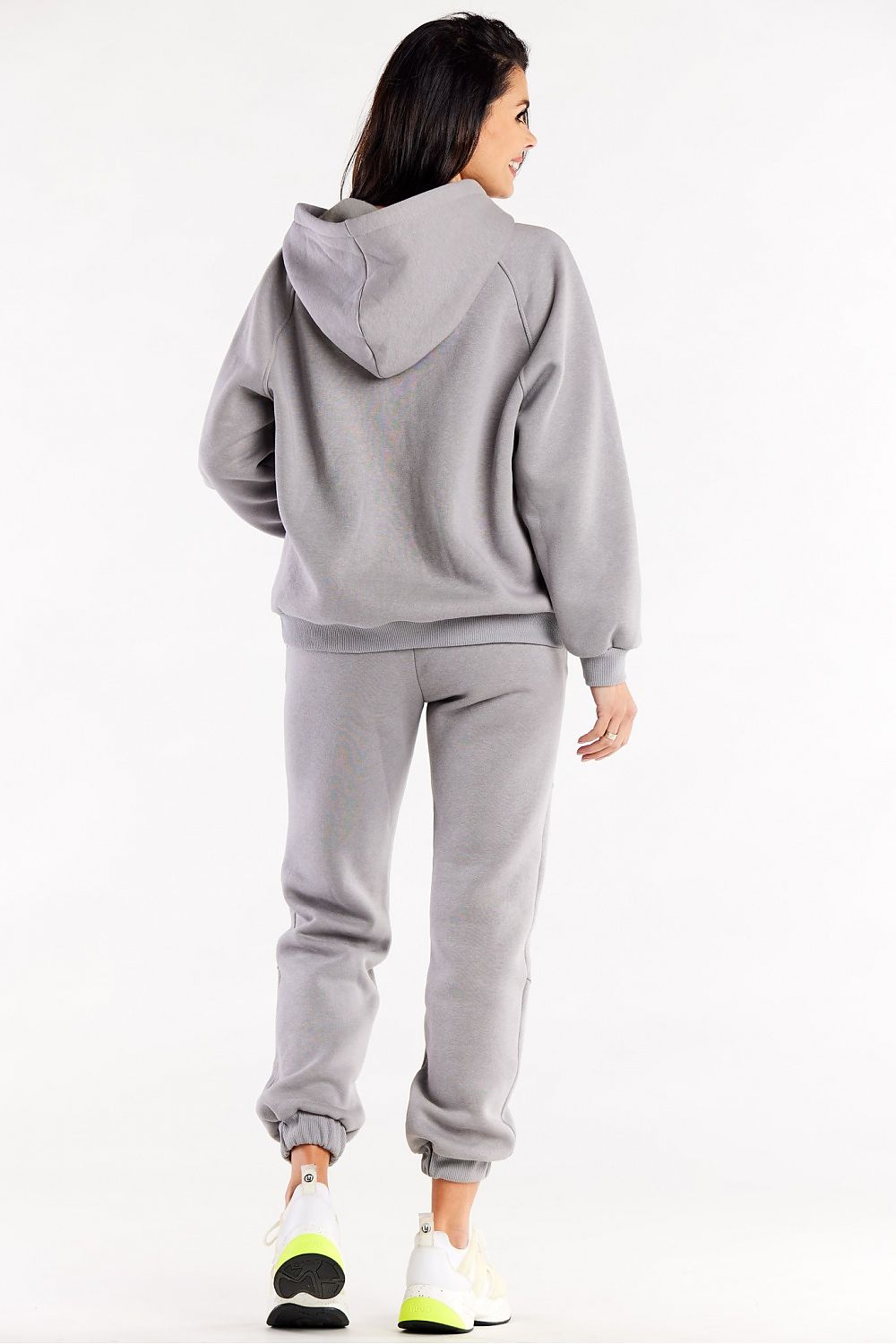 Side view of Luxury Loose Sweatpants with Elastic Waist by Infinite You, featuring slip pockets and a relaxed fit.