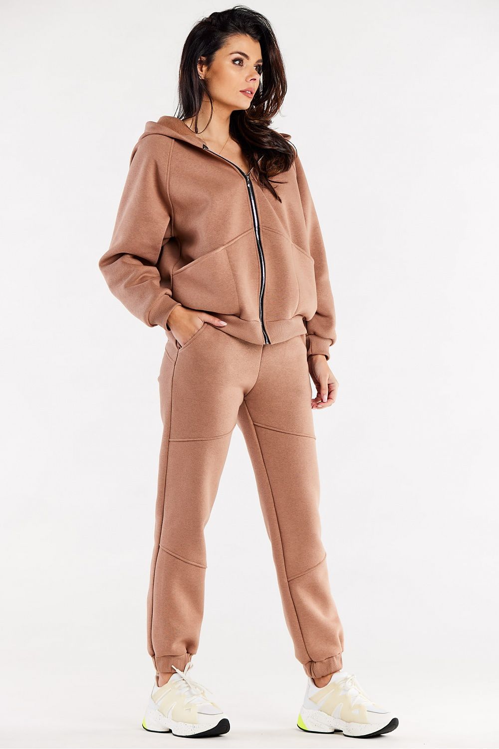 Model wearing Luxury Loose Sweatpants With Decorative Stitching And Elastic Waist By Infinite You, demonstrating a chic and comfortable look in stylish everyday wear.
