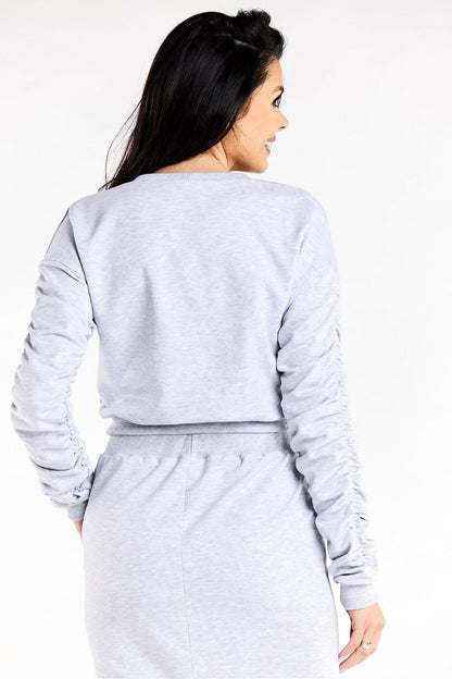 Full view of the Luxurious Long Sleeve Women's Sweatshirt With Decorative Creases from Infinite You, perfect for sophisticated casual wear.