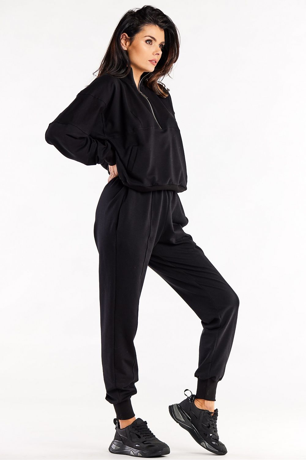 Luxury Loose Tracksuit Trousers with Decorative Seams and Ribbed Cuffs by Infinite You, showcasing elegant stitching and stylish pockets.