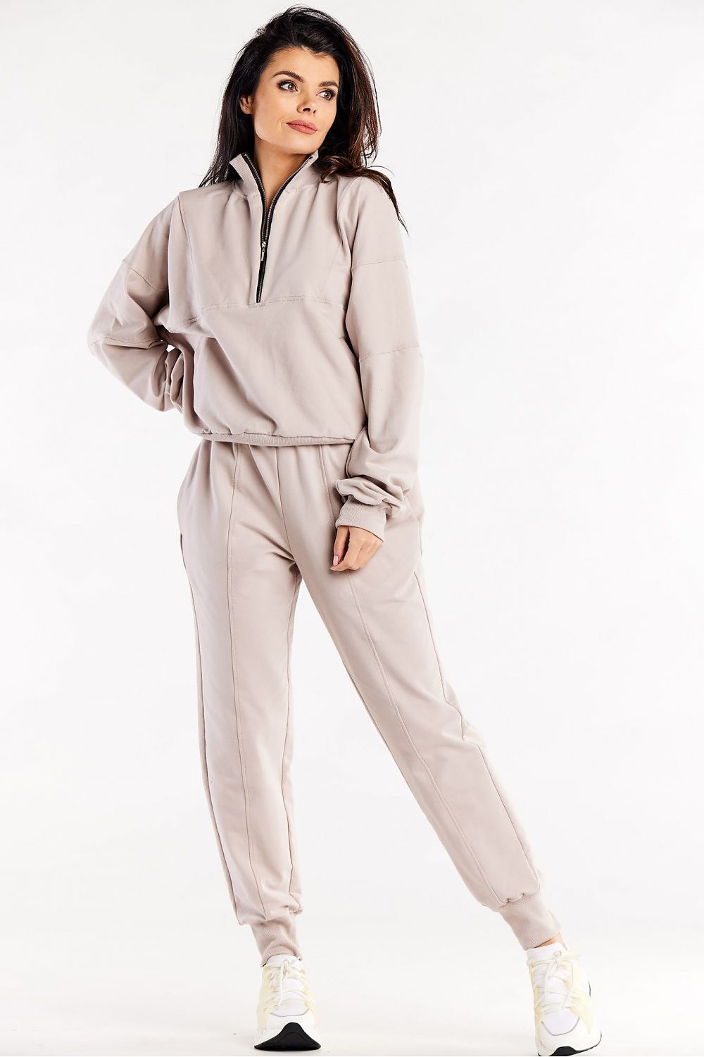 A model wearing Luxury Loose Tracksuit Trousers with Decorative Seams and Ribbed Cuffs by Infinite You, exuding comfort and luxury.