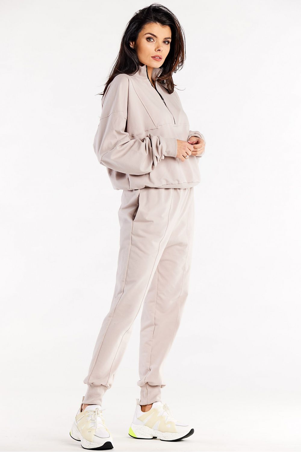 Luxury Loose Tracksuit Trousers with Decorative Seams and Ribbed Cuffs by Infinite You, displayed on a stylish background to emphasize its chic design.