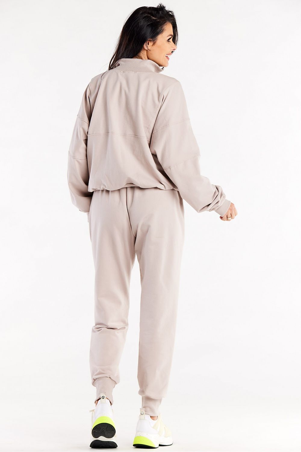 Detail view of Luxury Loose Tracksuit Trousers with Decorative Seams and Ribbed Cuffs by Infinite You, featuring the unique elastic waistband and ribbed cuffs.