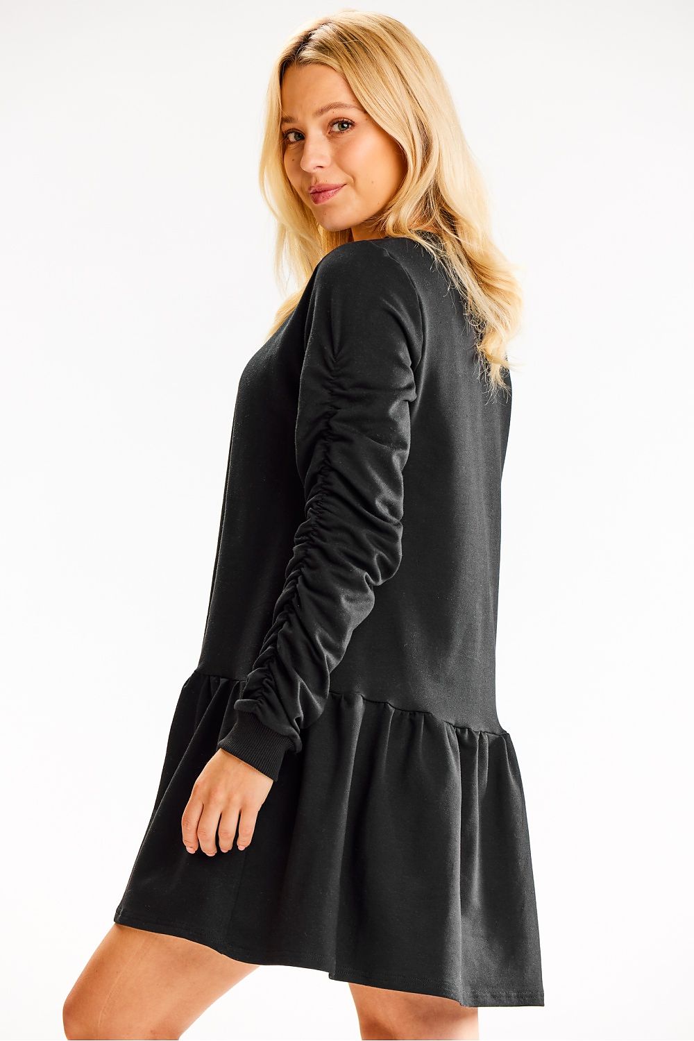 Back view of the Luxurious Loose Cotton Dress with Ruffled Hem by Infinite You, featuring the stylish ruffle at the bottom and casual charm.