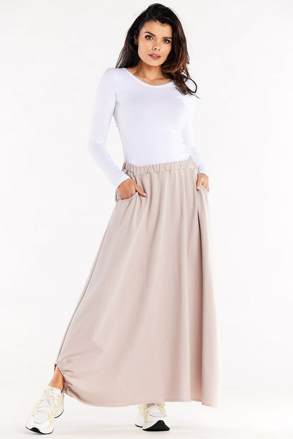 Elegant Long Trapeze Skirt with Elastic Waistband and Pockets by Infinite You, showcasing a luxurious drape and stylish cutouts.
