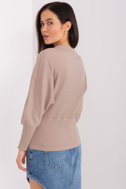 Elegant Batwing Cotton Blouse with Unique Ribbed Texture and Comfortable Fit for Everyday Wear, showcasing the luxurious fabric and design details.