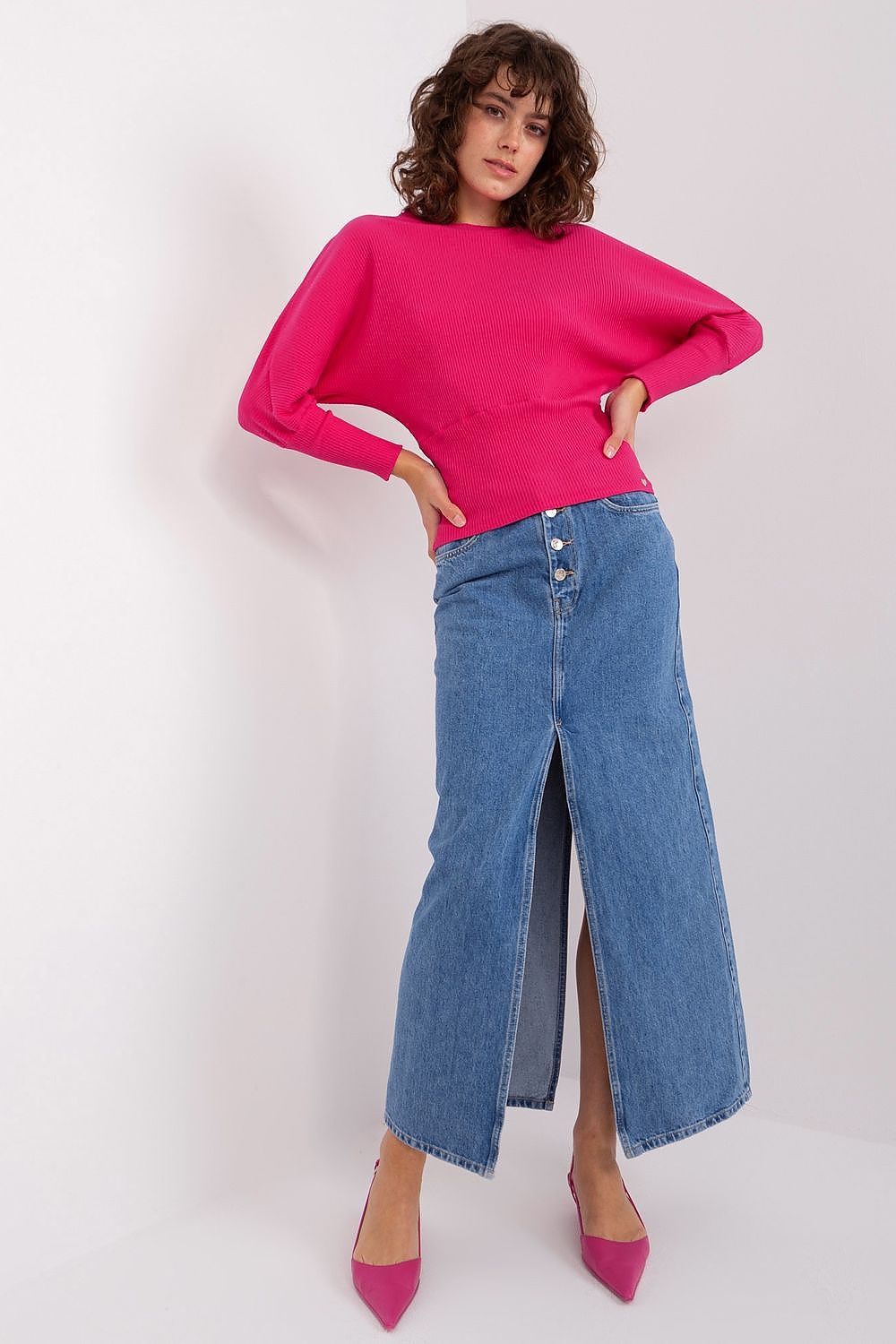 Elegant Batwing Cotton Blouse with Unique Ribbed Texture and Comfortable Fit for Everyday Wear, designed for versatility in casual and work settings.