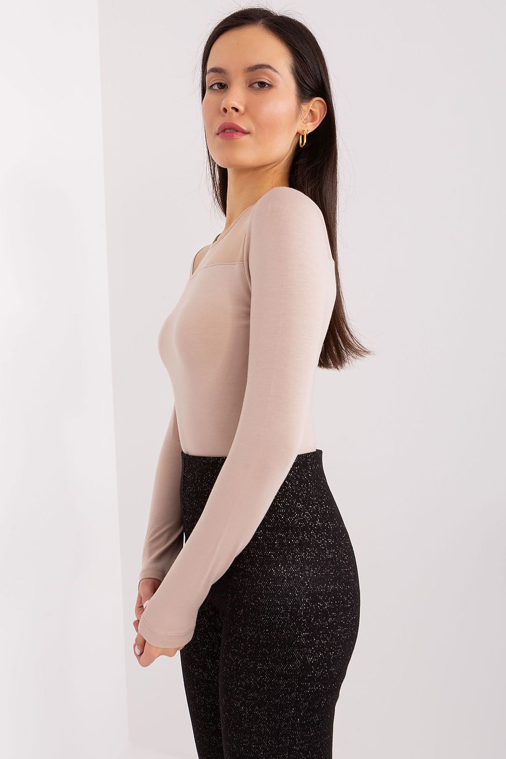 Close-up of the Elegant Viscose Blouse With Long Sleeves And Original Textured Finish by BFG, highlighting its unique variegated texture and sophisticated style.