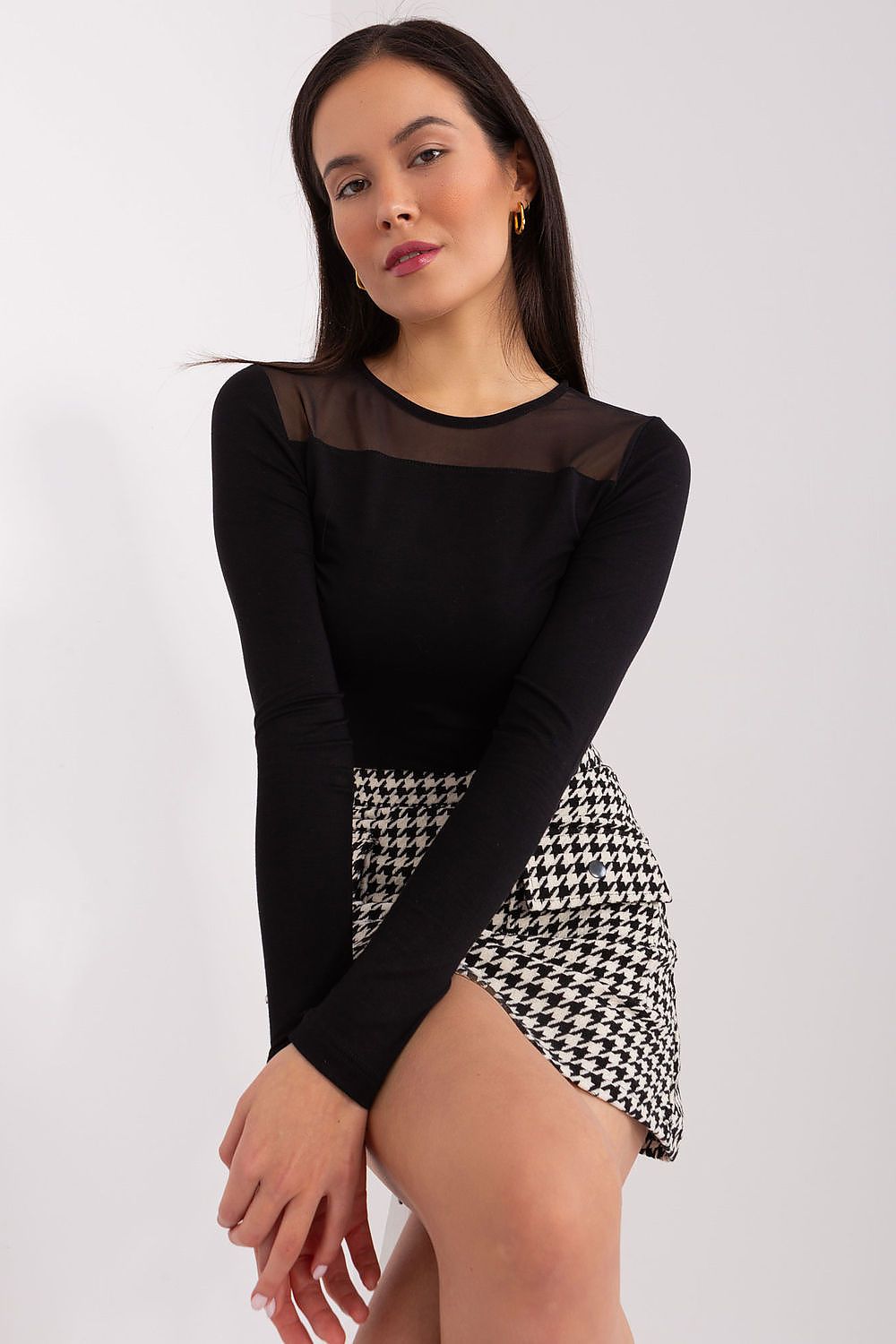 Elegant Viscose Blouse With Long Sleeves And Original Textured Finish by BFG styled with accessories, illustrating its versatility for both casual and formal occasions.