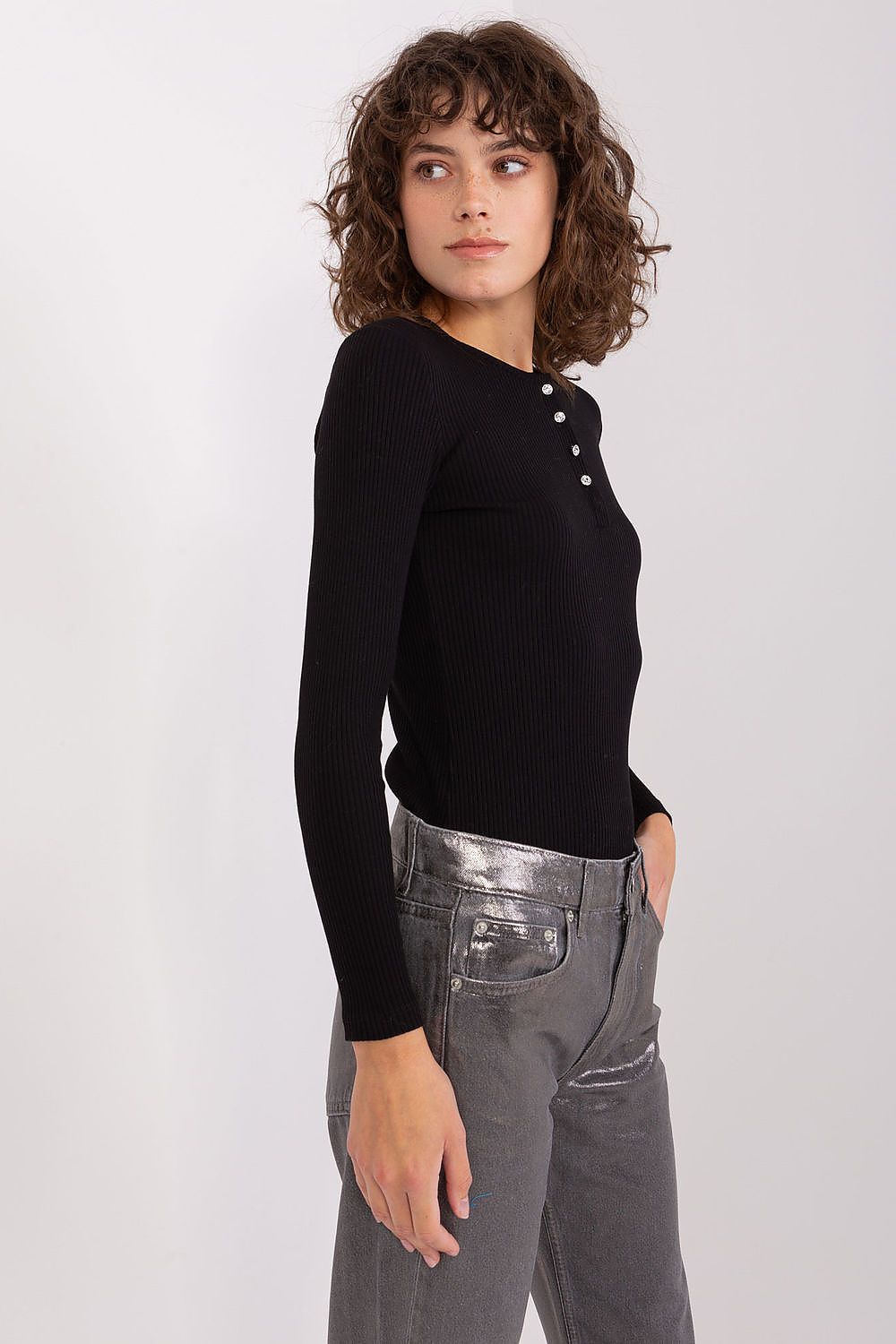 Close-up of the stunning button fastening with zircons on an elegant cotton blouse by BFG, showcasing sophisticated style.